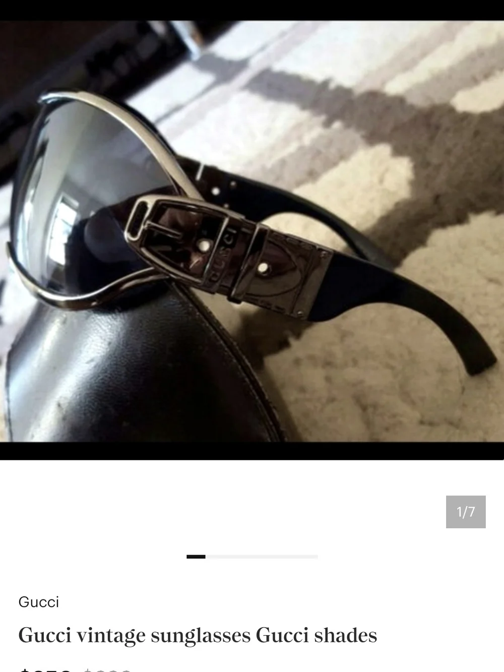 Gucci Black Sunglasses with Silver Buckle Accent